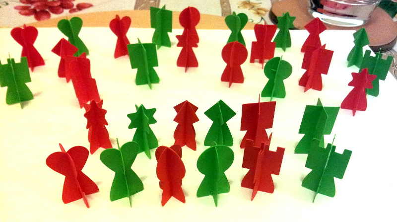 A selection of counters in red and green.