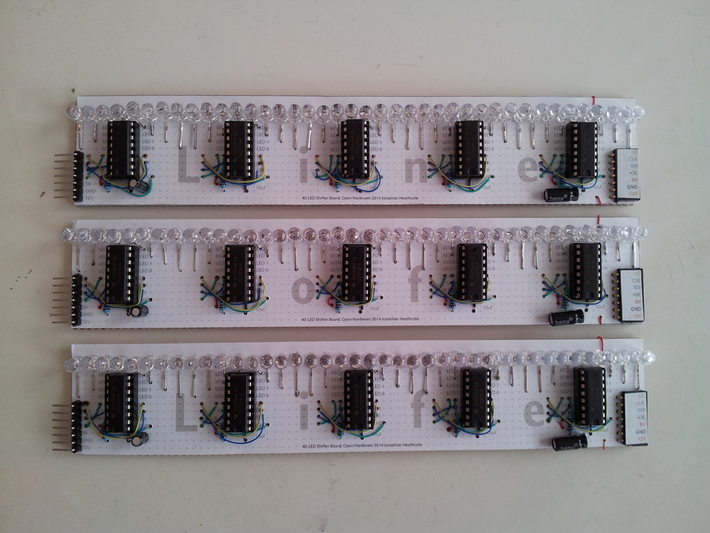 Three completed circuit boards